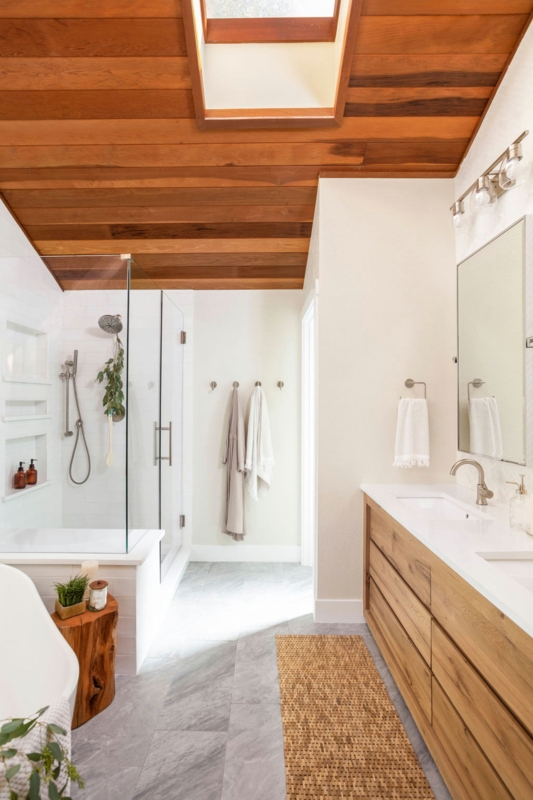 Wood Plank Ceiling with Skylight and Matching Vanity