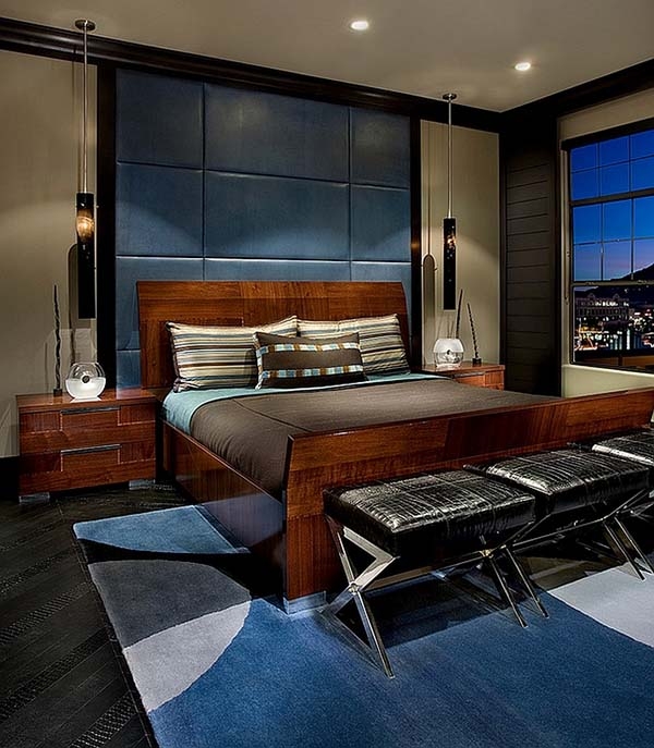 Wood Platform Bed against Navy Blue Gridded Padded Wall