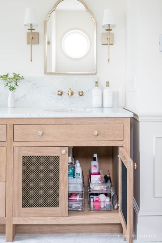 Wood Vanity with Gold Mesh Doors and Clear Acrylic Under-Sink Storage