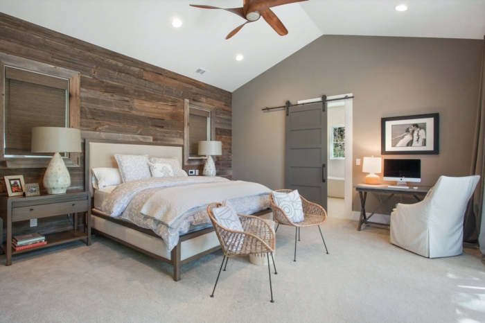 Woven Rattan Accent Chairs for a Rustic Modern Bedroom with Wood Wall
