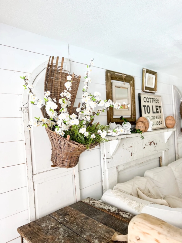 Woven Wall Basket Floral Arrangement on Cottage Shiplap Wall Decor