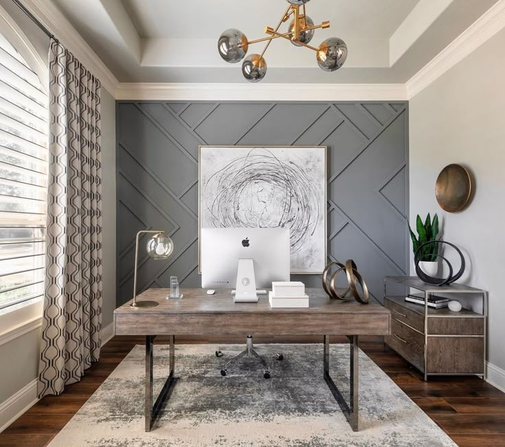 Writing Desk Workspace with Modern Globe Lighting and Charcoal Geometric Wall