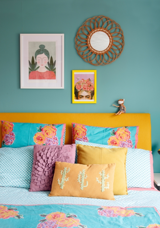 Yellow Upholstered Headboard with Maximalist Floral Bedding