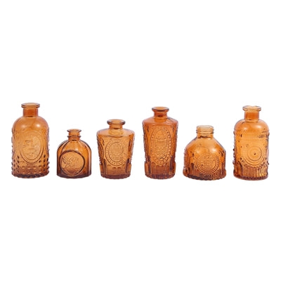 Amber Glass Bud Vase Set of Six with Embossed Motifs.