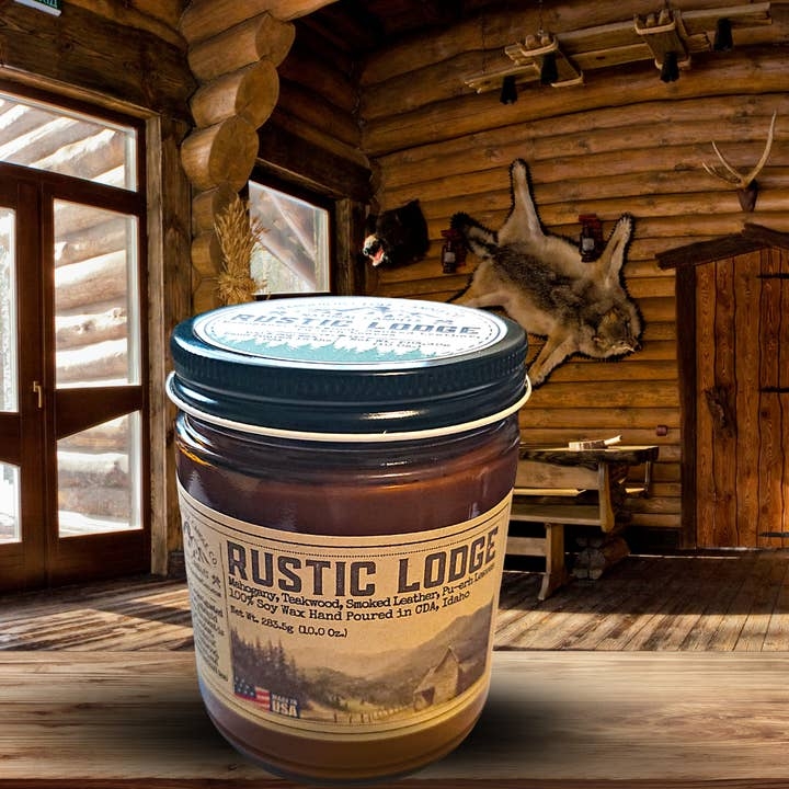 Amber Glass Jar Candle Styling with Rustic Mountain Landscape Label
