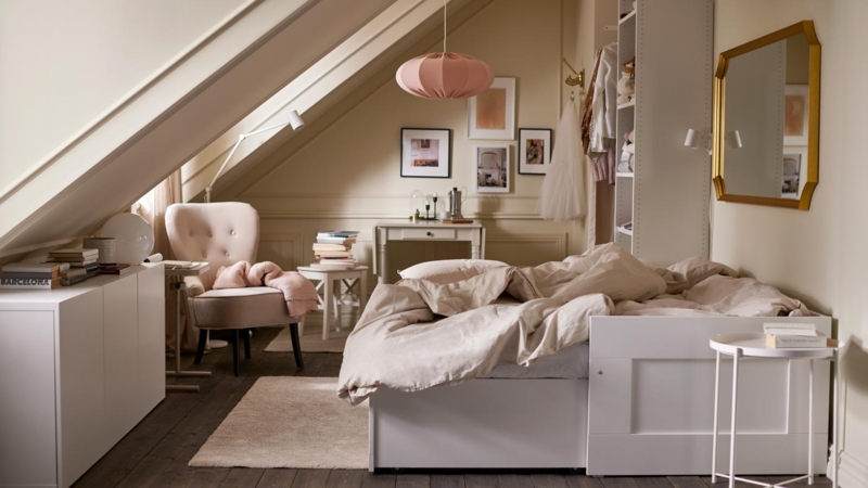Attic Daybed Layout with Slanted Ceiling and Pink Pleated Pendant