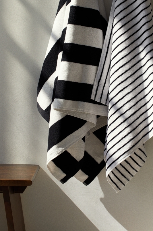Bath Towel with Fringed Edges and Bold Horizontal Stripes.