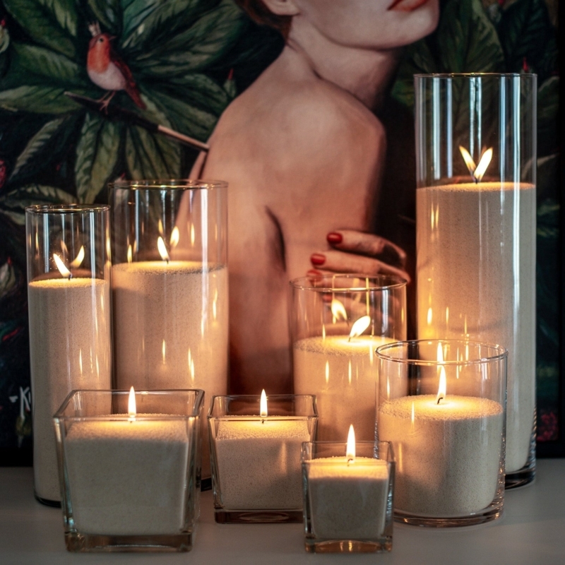 Candle Sand Wax Beige Granular Texture in Glass Vessels Lit