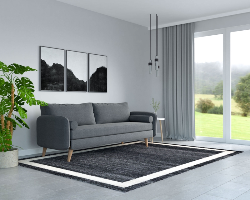 Charcoal Sofa with Tapered Legs in a Monochromatic Gray Living Room