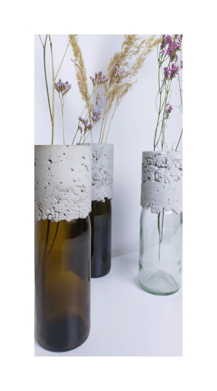 Concrete and Glass Vases: Upcycled Bottle Base with Jagged Transition.