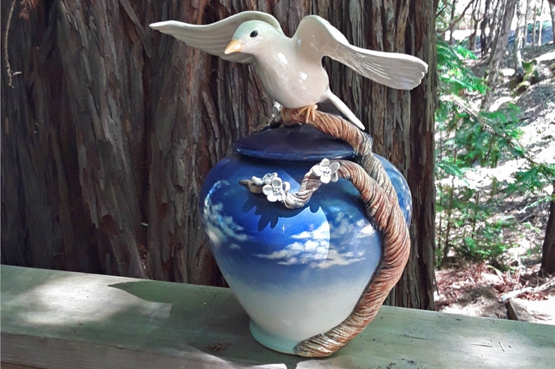 Decorative Jar: Hand-Painted Sky Gradient with Sculpted Bird Topper