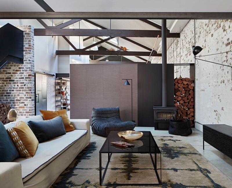 Freestanding Wood Stove Styling in Industrial Loft Living Room