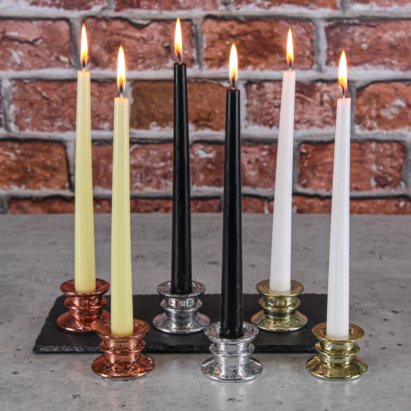 Industrial Taper Candles with Mixed Metallic Holders on a Slate Base