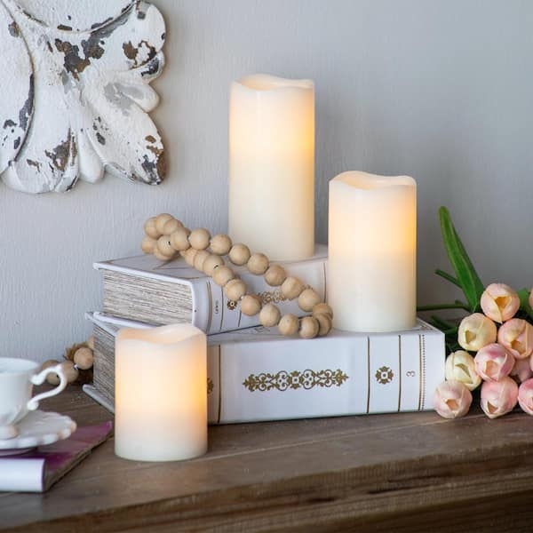 Ivory Flameless Pillar Candles Staggered Trio with Melted Edge Silhouette