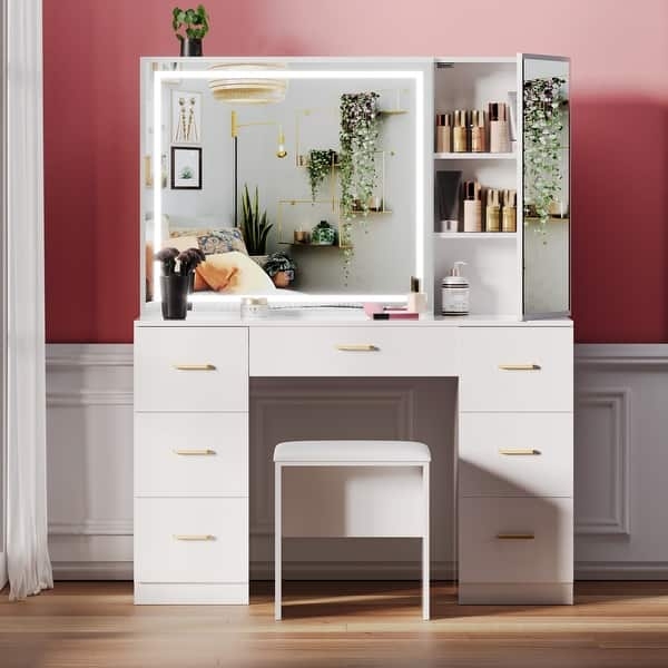 Large Makeup Vanity with Seven Drawers, Lighted Mirror and Gold Accents.