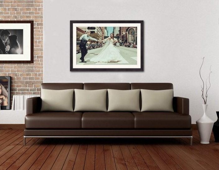 Large Matted Wall Art in Transitional Living Space with Brick Wall