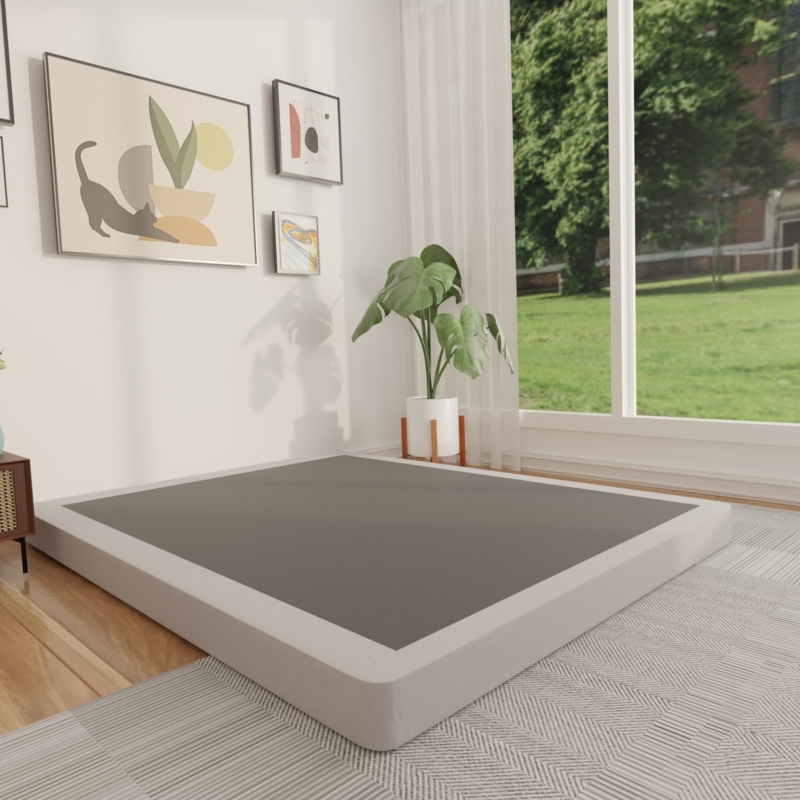 Low-Profile Box Spring, Light Gray Upholstered, Non-Slip Top Surface.