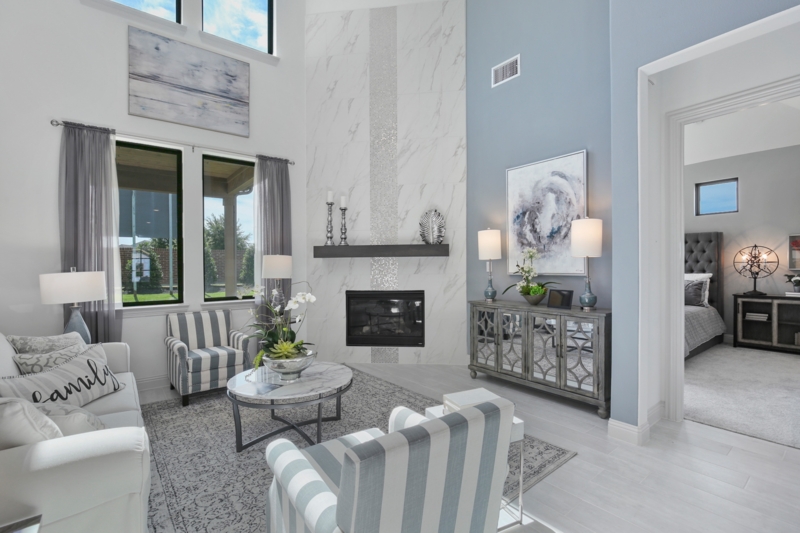 Marble Corner Fireplace Surround with Light Blue Accent Wall Design