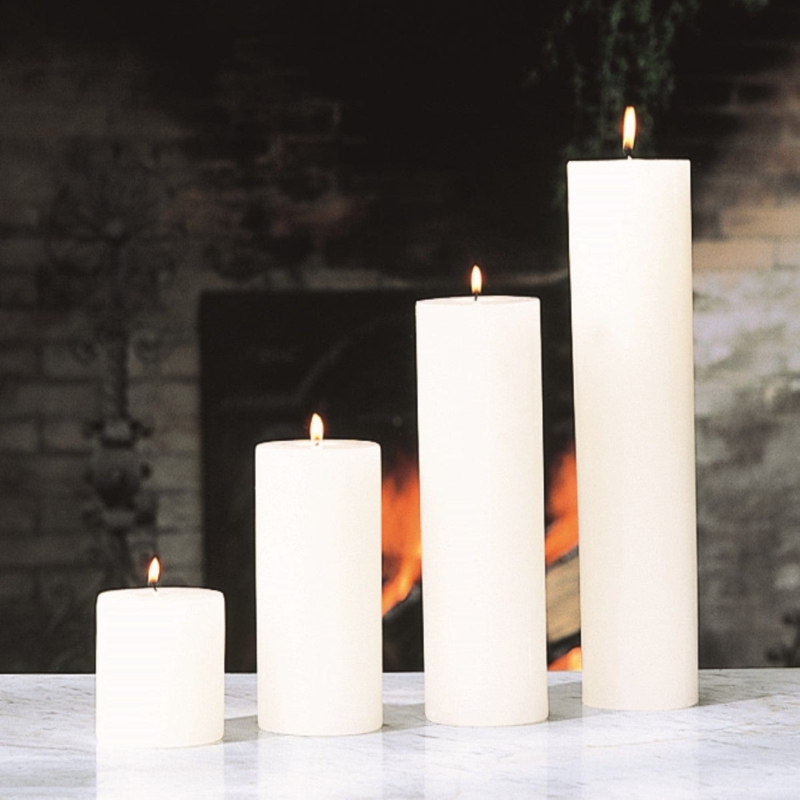 Matte Finish Pillar Candle Set Graduated Heights on Marble Hearth