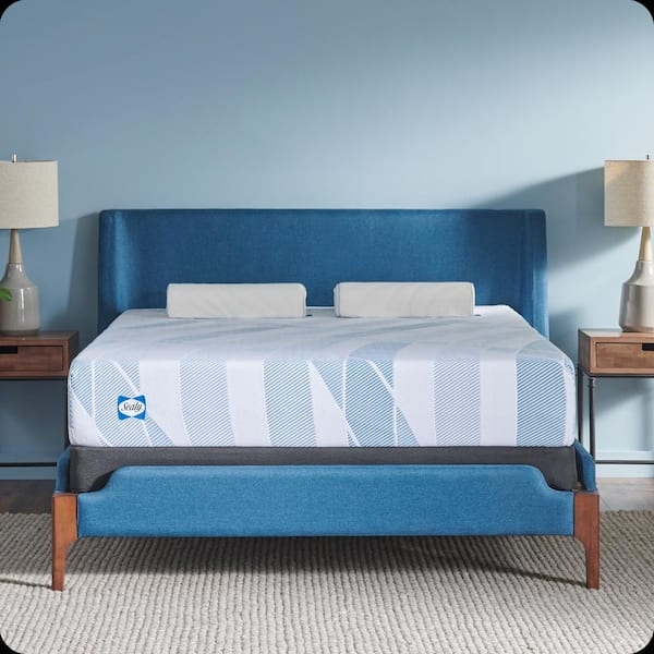 Mattress with Diagonal Striped Ticking on Upholstered Frame