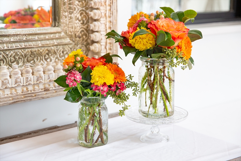 Rustic Glass Jar Vases with Vibrant Citrus Floral Arrangements
