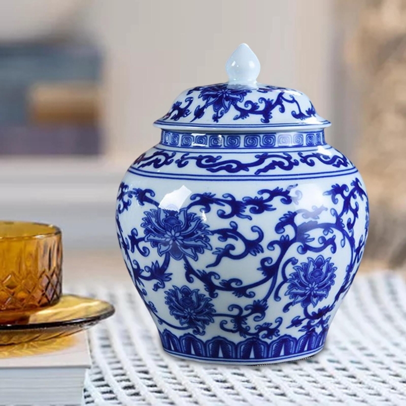 Temple Jar with intricate floral vine pattern and glossy finish.