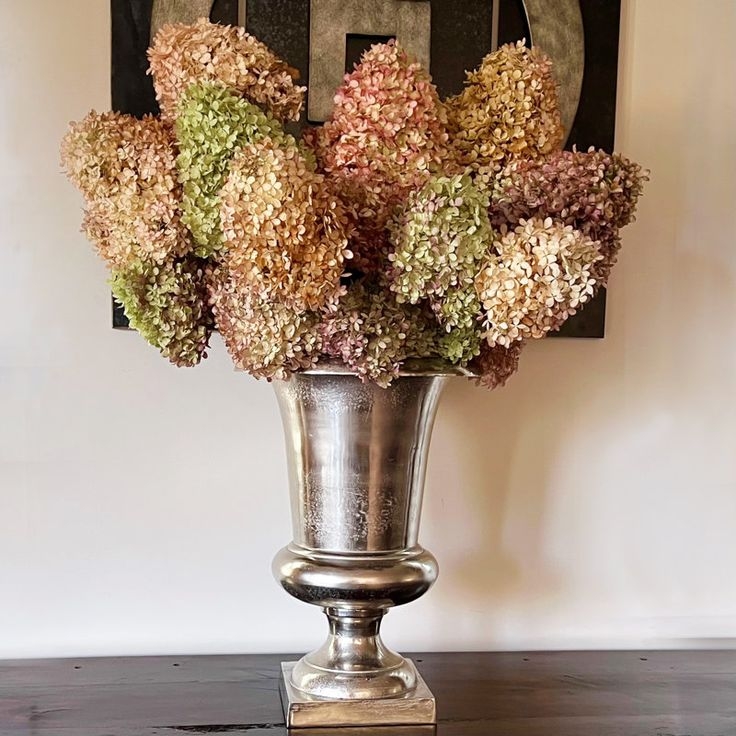 Trophy Vase: Silver Polished Metal Pedestal Hydrangea Arrangement (67 chars)