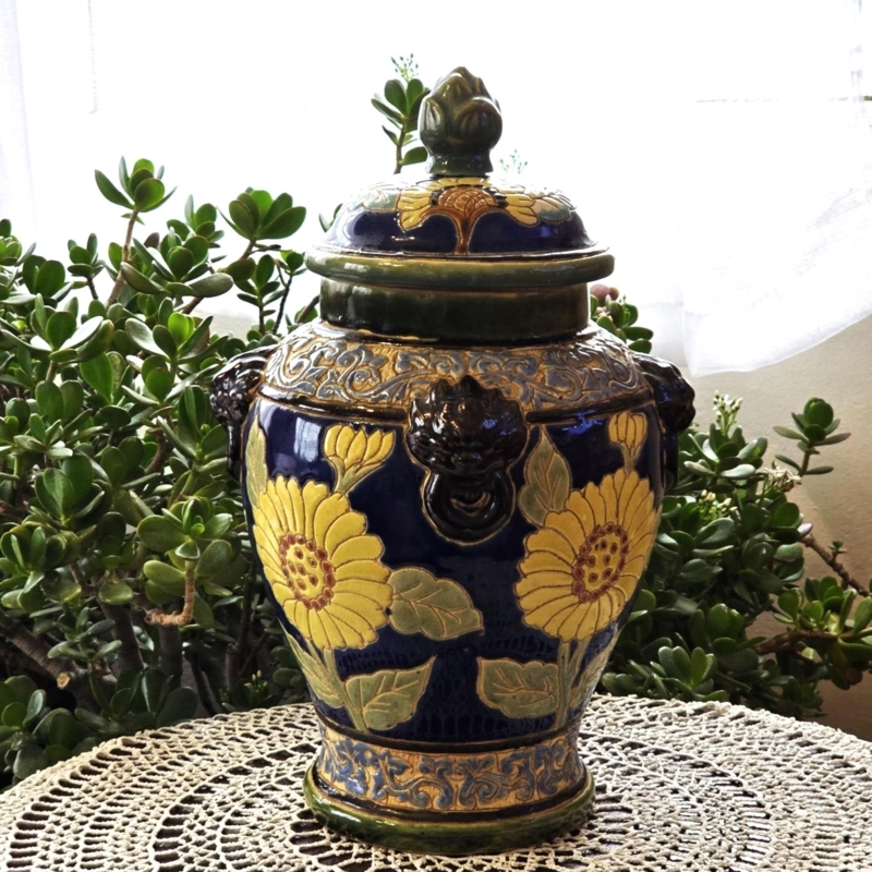 Urn Vase: Navy Ceramic with Sunflower Motif and Lion Head Handles