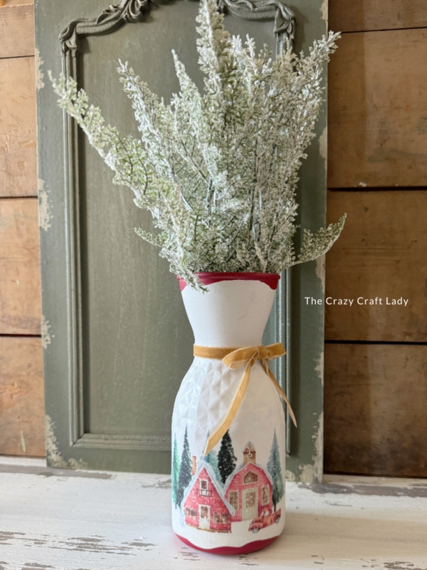 Vase in Carafe Silhouette with Frosted Greenery and Ribbon