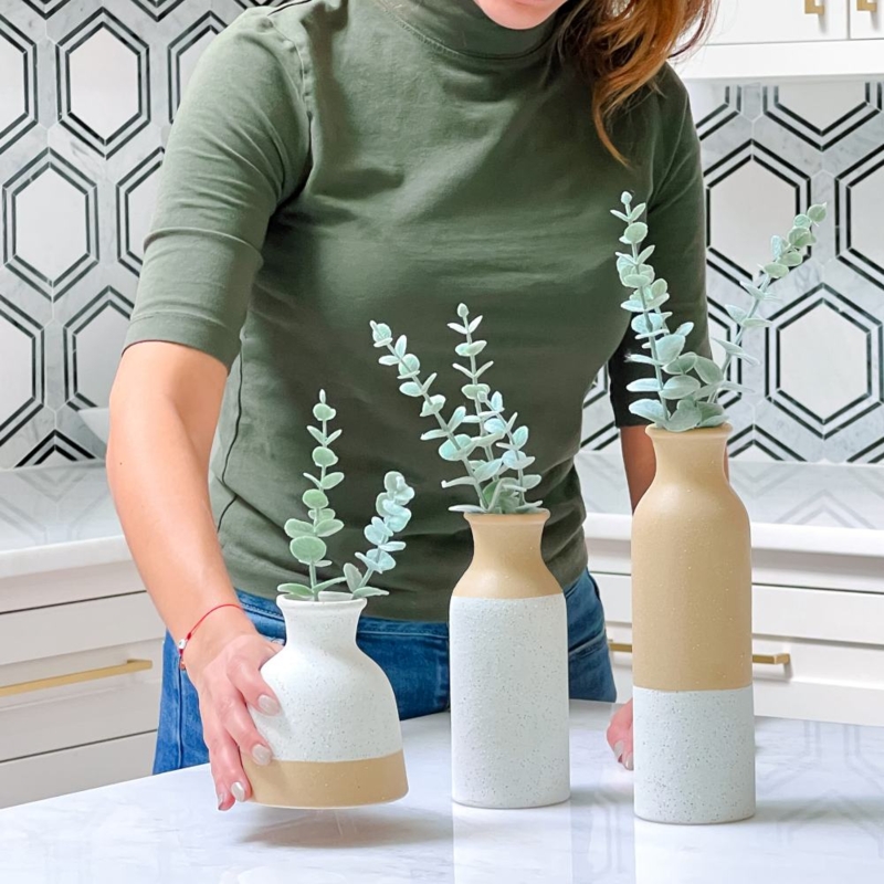 Vase Set: Two-Tone Ceramic Decorative Vessels with Graduated Heights.