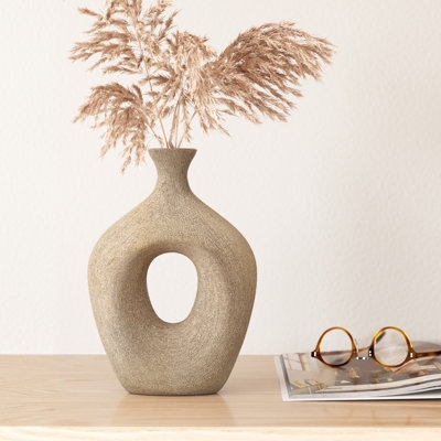 Vase with Central Cutout: Sandy Texture Sculptural Ceramic Decor.