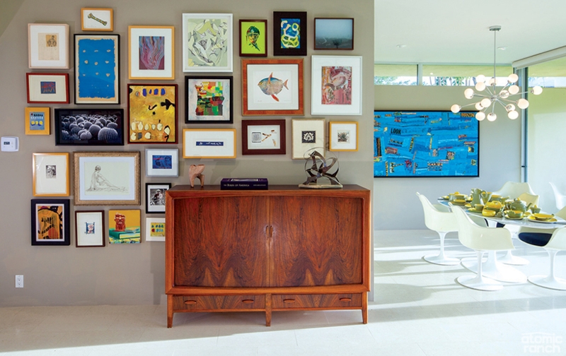 Wall Art Curated Gallery Wall, Wood Credenza, Tulip Chairs in Dining Room