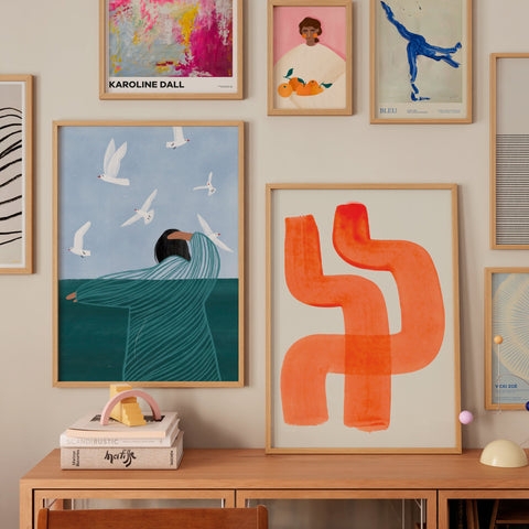 Wall Art: Gallery Wall with Consistent Wood Frame Style