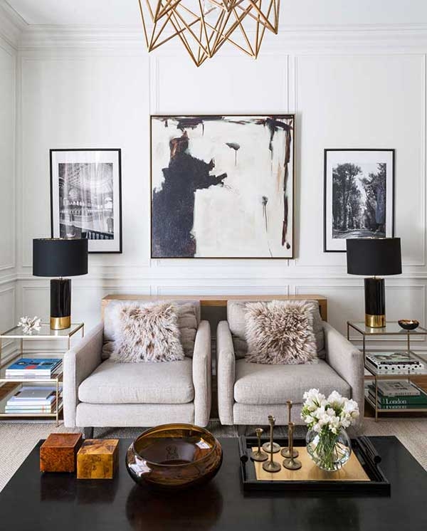Wall Art: Statement Abstract Piece in Symmetrical Living Room Design.