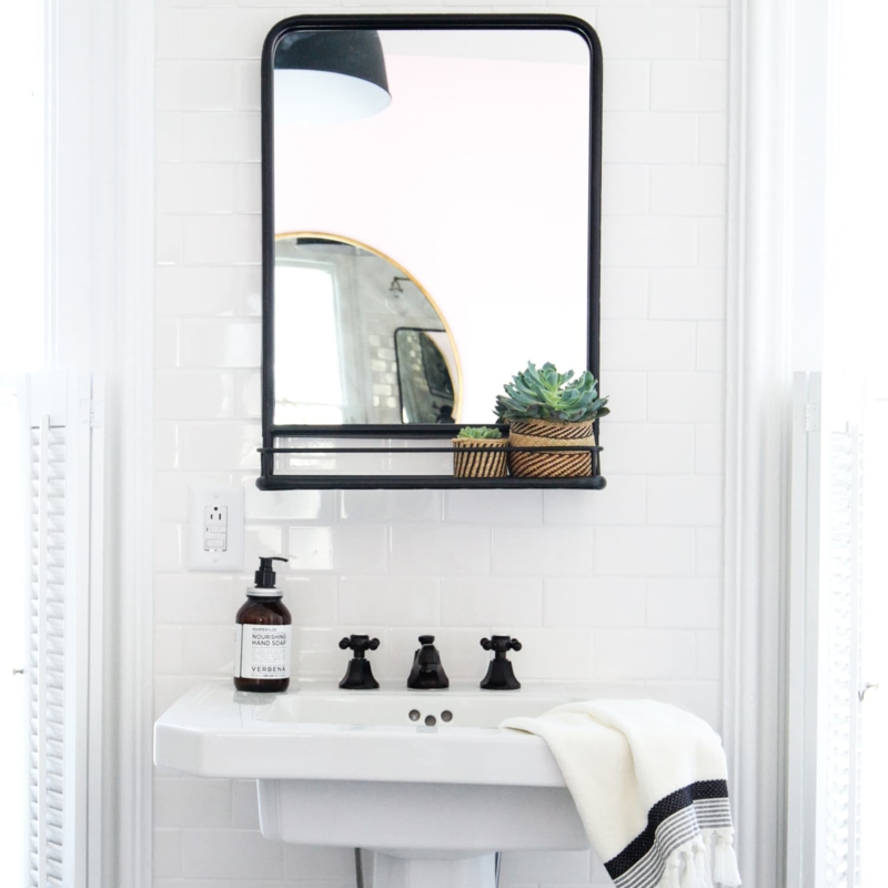 Wall Mirror with Matte Black Frame and Integrated Shelf Over Sink