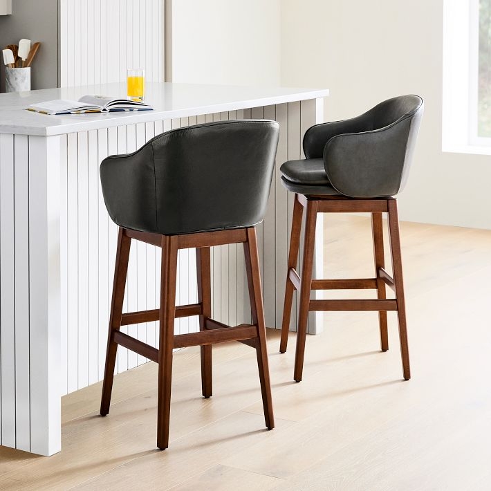 Bar Stool with Integrated Arms and Bucket Seat Silhouette