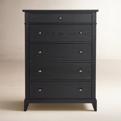 Black Chest of Drawers showing Wood Grain Texture and Tapered Feet
