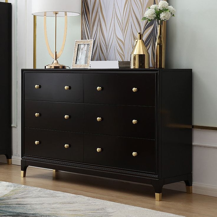 Black Double Dresser with Gold Knobs and Tapered Legs with Caps