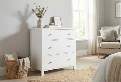 Coastal Style Chest With Clean Lines and Round Metal Knobs
