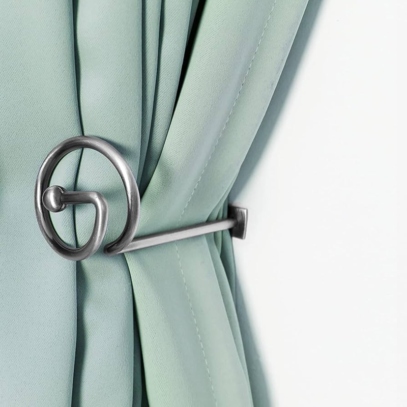 Curtain Holdback: Brushed Silver Finish with Decorative Swirl Design