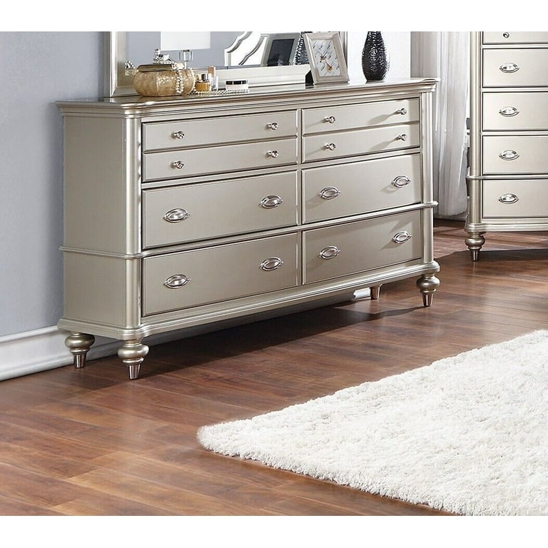 Elegant Eight Drawer Dresser with Metallic Silver Finish and Bun Feet
