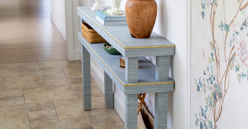 Light Blue Console Table with Grasscloth Texture & Gold Nailhead Trim