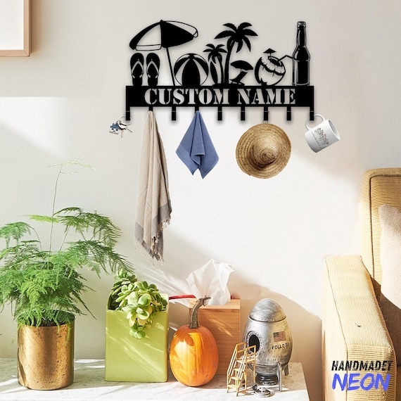 Matte Black Wall Mounted Hook Rack with Beach Silhouettes and Customizable Nameplate.