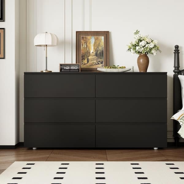 Minimalist Dresser with Handleless Flat Fronts and Cylindrical Legs