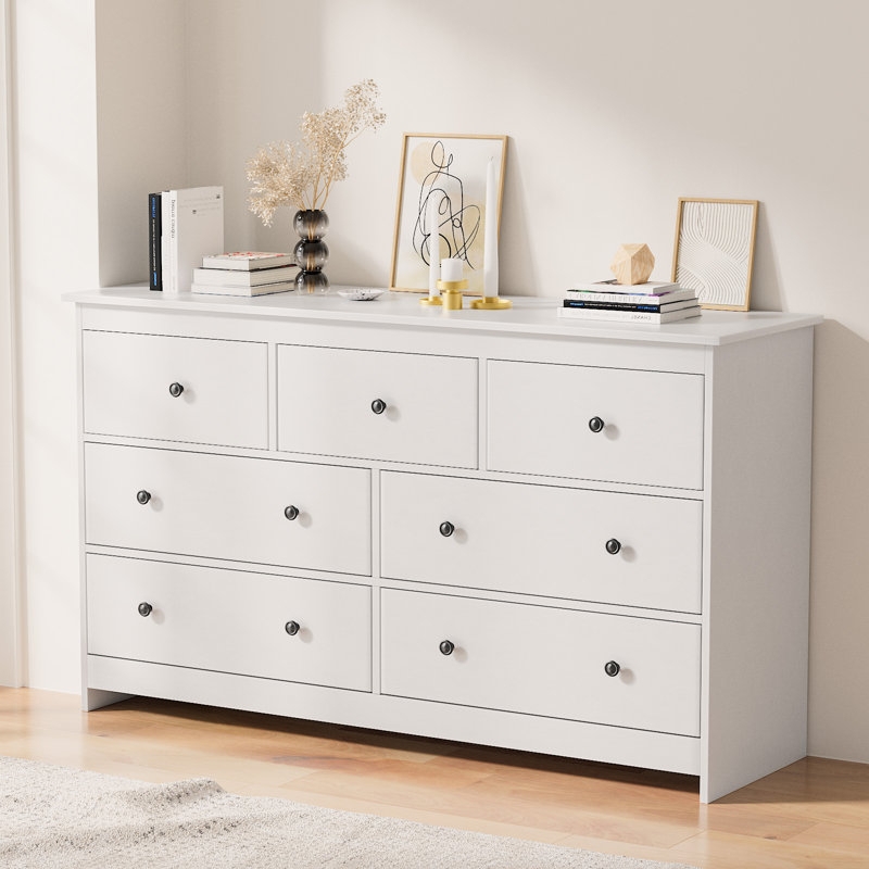Minimalist White 7-Drawer Dresser with Contrasting Black Knobs
