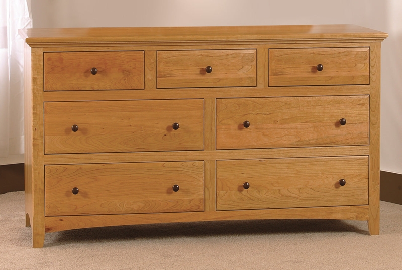 Traditional Wood Dresser with Arched Base and Graduated Drawers