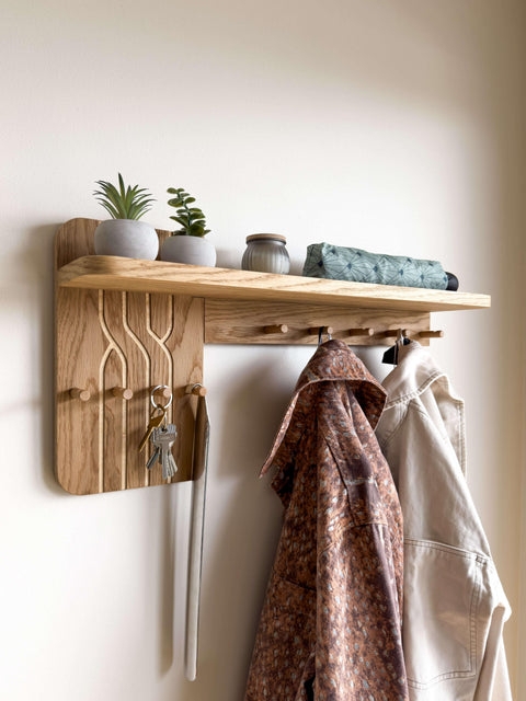 Wall Mounted Coat Rack Shelf, Light Oak Finish with Vertical Grooves.