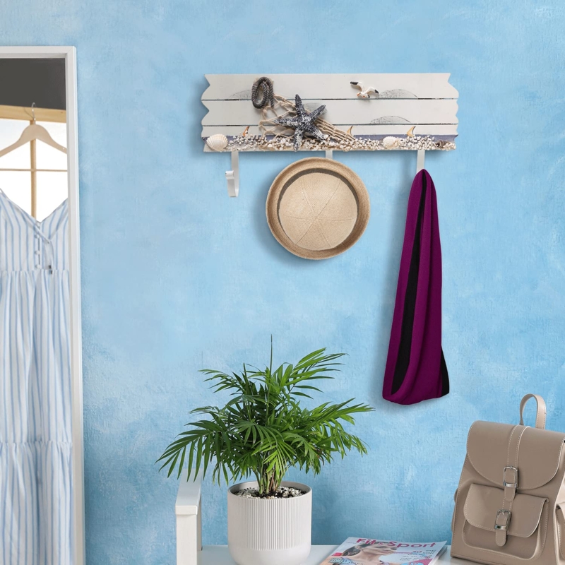 Wall Mounted Coat Rack with Whitewashed Slats and Starfish Accent.