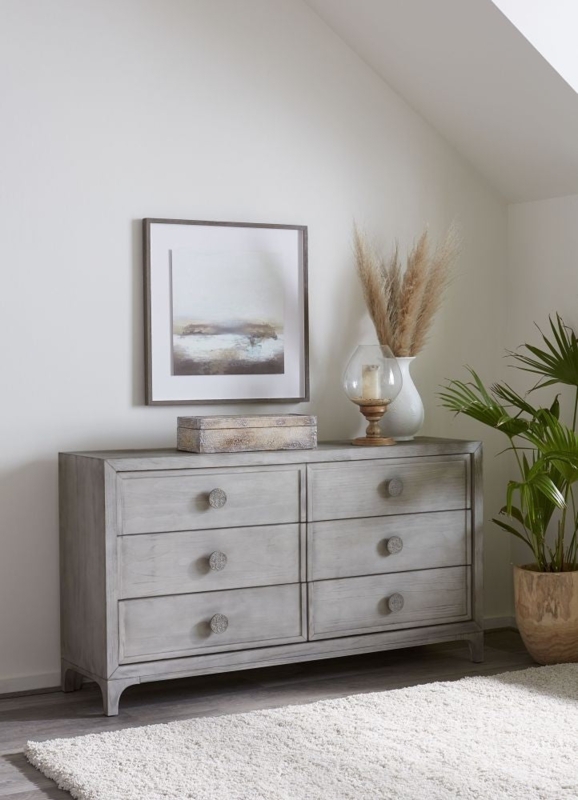 Weathered Gray Dresser with Medallion Hardware and Six Drawers