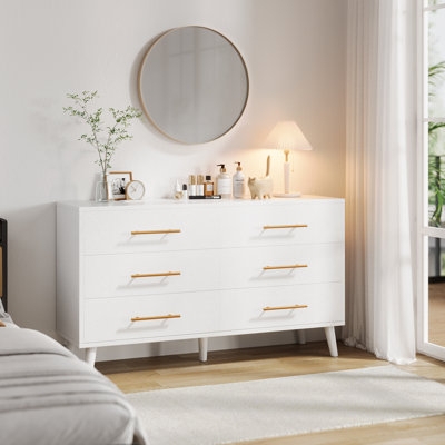 White Double Dresser with Gold Pull Handles and Tapered Legs